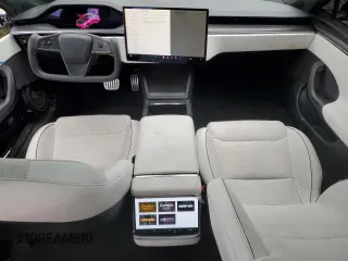 2023 Tesla Model S Plaid with VIN 5YJSA1E67PF511354, listed as a Copart auction lot 56648975 with 69,002 mi miles and Salvage title. Bid and sale history available at DreamBid. Image 8.