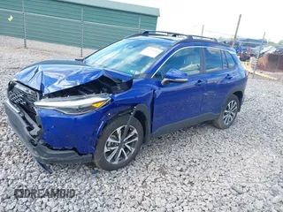 2024 Toyota Corolla Cross XLE with VIN 7MUDAABG8RV106100, listed as a IAAI auction lot 42220089 with 8,181 mi miles and . Bid and sale history available at DreamBid. Image 2.