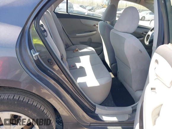 2011 Toyota Corolla L with VIN JTDBU4EE4B9144190, listed as a IAAI auction lot 42060728 with 115,299 mi miles. Bid and sale history available at carsss.com. Image 8.