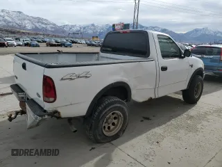 2003 Ford F-150 XL with VIN 2FTRF18W53CA04398, listed as a Copart auction lot 42981485 with 244,706 mi miles and Salvage title. Bid and sale history available at DreamBid. Image 3.