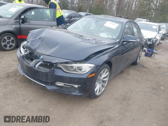 2013 BMW 3 Series 335i xDrive with VIN WBA3B9C50DJ899068, listed as a IAAI auction lot 41331622 with 156,216 mi miles. Bid and sale history available at carsss.com. Image 2.