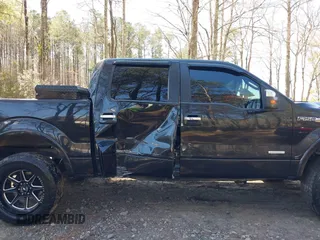 2011 Ford F-150 XLT with VIN 1FTFW1ET8BFA70797, listed as a IAAI auction lot 41909232 with 118,843 mi miles. Bid and sale history available at carsss.com. Image 6.