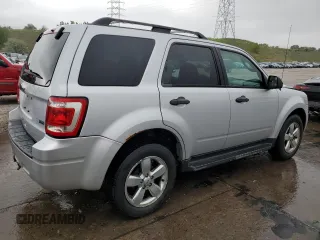 2011 Ford Escape XLT с VIN 1FMCU9DG8BKC62302, выставлен на аукционе Copart как лот 58240715 с пробегом 159 739 миль миль и Списание • Salvage title. История ставок и продаж доступна на DreamBid. Изображение 3.