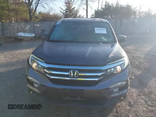 2017 Honda Pilot EX-L z VIN 5FNYF6H70HB069712, wystawiony jako IAAI lot #41828893 z przebiegiem 70 061 mil mil oraz . Historia ofert i sprzedaży dostępna na DreamBid. Obrazek 12.
