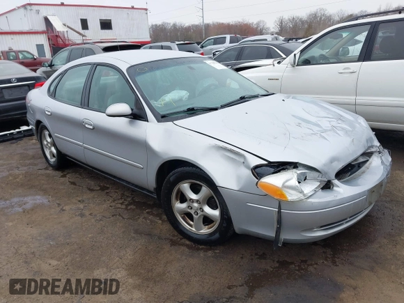 2003 Ford Taurus SE Standard with VIN 1FAFP53273G132268, listed as a IAAI auction lot 41790335 with 202,724 mi miles. Bid and sale history available at carsss.com. Image 1.