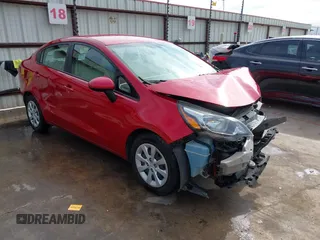 2013 Kia Rio LX with VIN KNADM4A31D6310504, listed as a IAAI auction lot 41579952 with 55,757 mi miles and . Bid and sale history available at DreamBid. Image 1.