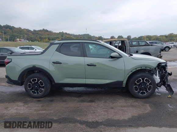 2022 Hyundai Santa Cruz SEL z VIN 5NTJCDAE1NH032206, wystawiony jako IAAI lot #40698704 z przebiegiem 40 182 mil mil oraz . Historia ofert i sprzedaży dostępna na DreamBid. Obrazek 14.