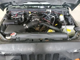 2007 Jeep Wrangler Unlimited Sahara z VIN 1J4GA59167L107870, wystawiony jako Copart lot #58346115 z przebiegiem 180 107 mil mil oraz Czysty tytuł • Clean title. Historia ofert i sprzedaży dostępna na DreamBid. Obrazek 11.