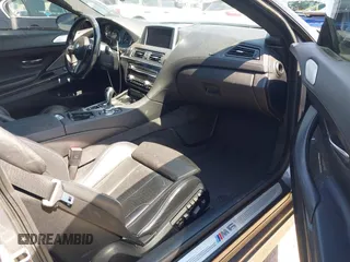2013 BMW M6 with VIN WBSLX9C51DC968593, listed as a IAAI auction lot 42465979 with 88,010 mi miles and . Bid and sale history available at DreamBid. Image 5.