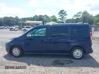 2014 Ford Transit Connect XLT z VIN NM0GS9F76E1140649, wystawiony jako IAAI lot #42306549 z przebiegiem 188 947 mil mil oraz . Historia ofert i sprzedaży dostępna na DreamBid. Obrazek 14.