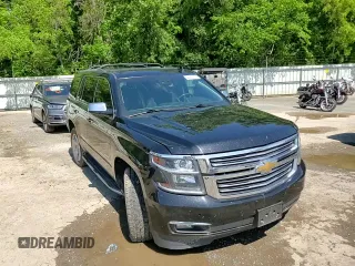 2018 Chevrolet Tahoe Premier with VIN 1GNSKCKC1JR133625, listed as a Copart auction lot 54900974 with 130,921 mi miles and Salvage title. Bid and sale history available at DreamBid. Image 12.