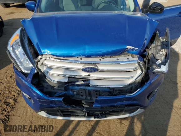 2019 Ford Escape SE z VIN 1FMCU9GDXKUB24265, wystawiony jako Copart lot #54052855 z przebiegiem 60 479 mil mil oraz Czysty tytuł • Clean title. Historia ofert i sprzedaży dostępna na DreamBid. Obrazek 12.