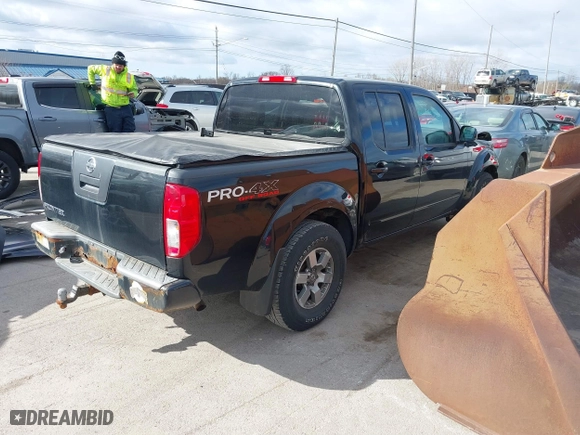 2009 Nissan Frontier SE with VIN 1N6AD07U09C404023, listed as a IAAI auction lot 41883164 with 100,724 mi miles. Bid and sale history available at carsss.com. Image 4.