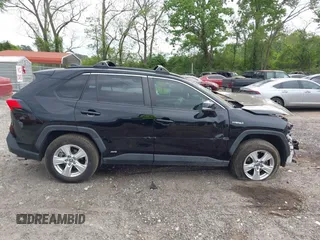 2021 Toyota RAV4 Hybrid XLE with VIN JTMRWRFV2MD133113, listed as a IAAI auction lot 42087394 with 103,019 mi miles and . Bid and sale history available at DreamBid. Image 13.