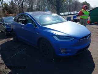 2019 Tesla Model X 75D with VIN 5YJXCBE28KF186404, listed as a IAAI auction lot 41815026 with 72,454 mi miles. Bid and sale history available at carsss.com. Image 1.