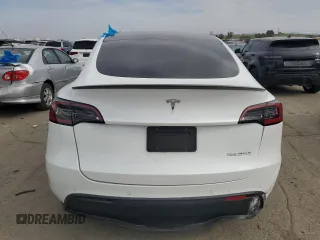 2022 Tesla Model Y Performance with VIN 7SAYGDEF1NF410241, listed as a Copart auction lot 45017155 with 42,652 mi miles and Salvage Title. Bid and sale history available at DreamBid. Image 6.