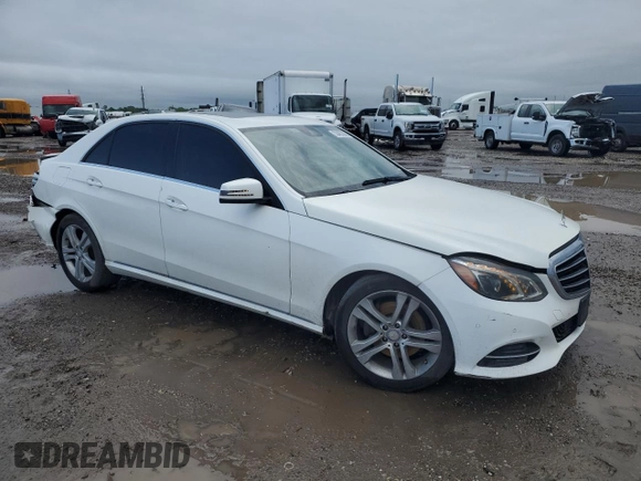 2014 Mercedes-Benz E 350 Sport with VIN WDDHF5KB8EA865027, listed as a Copart auction lot 53482265 with 166,648 mi miles and Salvage Title. Bid and sale history available at DreamBid. Image 4.