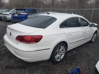 2014 Volkswagen CC Sport with VIN WVWBN7AN4EE505014, listed as a IAAI auction lot 41520345 with 140,422 mi miles and . Bid and sale history available at DreamBid. Image 4.