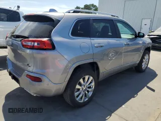 2017 Jeep Cherokee Overland z VIN 1C4PJMJS1HW588812, wystawiony jako Copart lot #58182885 z przebiegiem 77 794 mil mil oraz Szkoda całkowita • Salvage title. Historia ofert i sprzedaży dostępna na DreamBid. Obrazek 3.