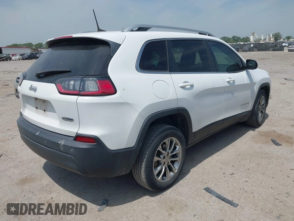 2019 Jeep Cherokee Latitude Plus with VIN 1C4PJLLBXKD220221, listed as a IAAI auction lot 42060125 with 89,452 mi miles and . Bid and sale history available at DreamBid. Image 4.