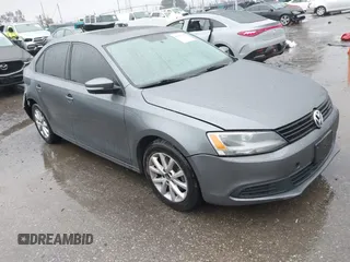 2011 Volkswagen Jetta SE z VIN 3VWDZ7AJ3BM379371, wystawiony jako IAAI lot #41709106 z przebiegiem 143 505 mil mil oraz . Historia ofert i sprzedaży dostępna na DreamBid. Obrazek 1.