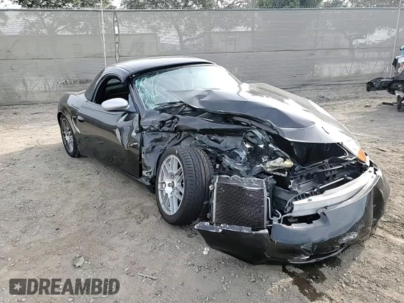 2000 Porsche Boxster z VIN WP0CA2984YU627674, wystawiony jako Copart lot #86027054 z przebiegiem 112 153 mil mil oraz Szkoda całkowita • Salvage title. Historia ofert i sprzedaży dostępna na DreamBid. Obrazek 10.