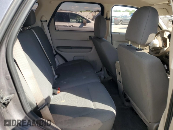 2012 Ford Escape XLS z VIN 1FMCU9C75CKB46512, wystawiony jako Copart lot #50629455 z przebiegiem Nie podano mil oraz Nie do naprawy • Non repairable. Historia ofert i sprzedaży dostępna na DreamBid. Obrazek 11.