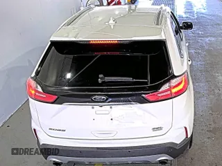 2019 Ford Edge SEL with VIN 2FMPK3J9XKBC37759, listed as a IAAI auction lot 42666643 with 103,812 mi miles and . Bid and sale history available at DreamBid. Image 7.