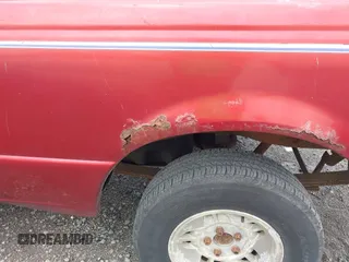 1997 Ford Ranger XLT z VIN 1FTCR10A2VPB59294, wystawiony jako IAAI lot #42676586 z przebiegiem 174 042 mil mil oraz . Historia ofert i sprzedaży dostępna na DreamBid. Obrazek 13.