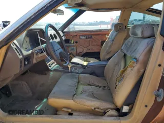 1982 Datsun 280ZX z VIN JN1HZ04S0CX433451, wystawiony jako Copart lot #53912864 z przebiegiem 200 629 mil mil oraz Tytuł czysty. Historia ofert i sprzedaży dostępna na DreamBid. Obrazek 7.