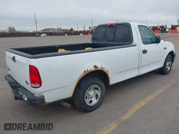 2003 Ford F-150 XL with VIN 1FTRF17273NA15637, listed as a IAAI auction lot 41952924 with 215,704 mi miles and . Bid and sale history available at DreamBid. Image 4.