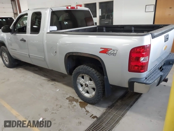 2013 Chevrolet Silverado 1500 LT with VIN 1GCRKSE73DZ328002, listed as a IAAI auction lot 41842745 with 124,496 mi miles and . Bid and sale history available at DreamBid. Image 3.