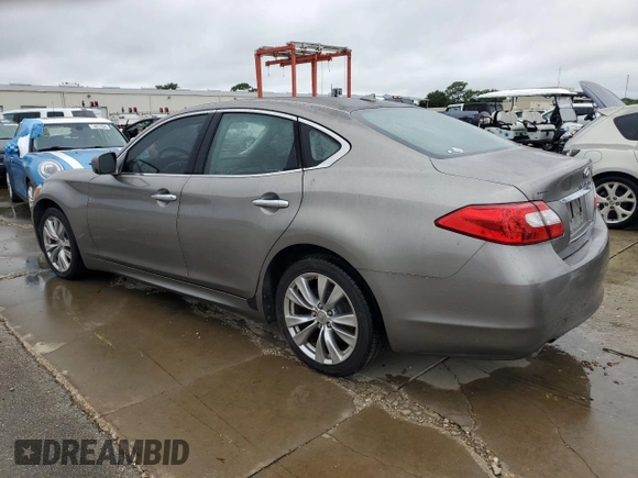2012 Infiniti M37 with VIN JN1BY1AP9CM333056, listed as a Copart auction lot 74810944 with 212,631 mi miles and Salvage Title. Bid and sale history available at carsss.com. Image 2.