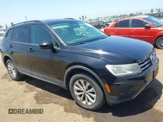 2018 Volkswagen Tiguan S with VIN 3VV1B7AX0JM075316, listed as a IAAI auction lot 42544309 with 122,459 mi miles and . Bid and sale history available at DreamBid. Image 1.