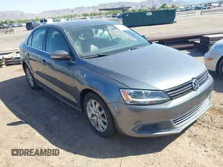 2014 Volkswagen Jetta SE with VIN 3VWD17AJXEM417724, listed as a IAAI auction lot 42481164 with 98,613 mi miles and . Bid and sale history available at DreamBid. Image 1.