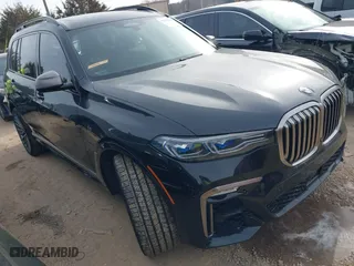2021 BMW X7 M50i with VIN 5UXCX6C07M9G39230, listed as a IAAI auction lot 41409366 with 63,965 mi miles. Bid and sale history available at carsss.com. Image 1.