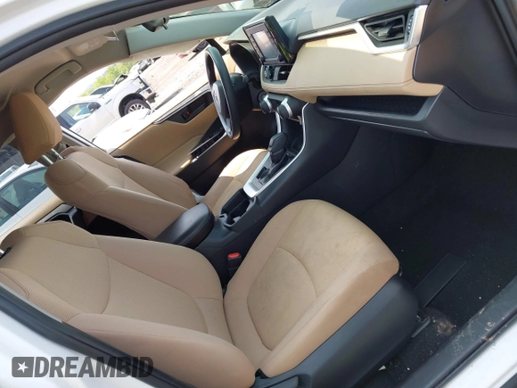 2019 Toyota RAV4 LE with VIN JTMF1RFV0KD045059, listed as a IAAI auction lot 42402598 with Not provided miles and . Bid and sale history available at DreamBid. Image 5.
