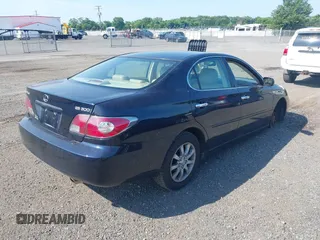 2002 Lexus ES 300 with VIN JTHBF30G020052297, listed as a IAAI auction lot 42630300 with 215,488 mi miles and . Bid and sale history available at DreamBid. Image 4.