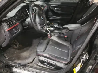 2012 BMW 3 Series 335i with VIN WBA3A9C55CF474823, listed as a Copart auction lot 87766325 with 146,985 mi miles and Salvage title. Bid and sale history available at DreamBid. Image 7.