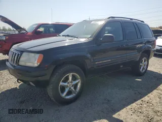 2002 Jeep Grand Cherokee Limited with VIN 1J8GW58NX2C158544, listed as a Copart auction lot 54937665 with 259,089 mi miles and Salvage title. Bid and sale history available at DreamBid. Image 1.