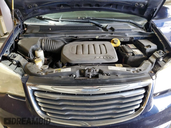 2013 Chrysler Town & Country Touring z VIN 2C4RC1BG6DR819136, wystawiony jako Copart lot #57430235 z przebiegiem 174 976 mil mil oraz Szkoda całkowita • Salvage title. Historia ofert i sprzedaży dostępna na DreamBid. Obrazek 12.