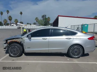 2017 Ford Fusion Energi SE with VIN 3FA6P0PU8HR242177, listed as a IAAI auction lot 42057898 with 119,435 mi miles. Bid and sale history available at carsss.com. Image 15.