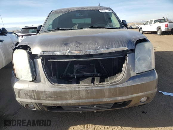 2011 GMC Yukon SLE with VIN 1GKS2AE0XBR381263, listed as a Copart auction lot 86322264 with 124,145 mi miles and Salvage Title. Bid and sale history available at carsss.com. Image 5.