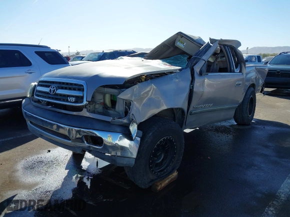 2001 Toyota Tundra SR5 with VIN 5TBRT34161S220253, listed as a IAAI auction lot 41598840 with 242,488 mi miles and . Bid and sale history available at carsss.com. Image 2.