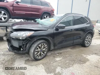 2020 Ford Escape Titanium z VIN 1FMCU9J95LUB19576, wystawiony jako Copart lot #50953325 z przebiegiem Nie podano mil oraz Nie do naprawy. Historia ofert i sprzedaży dostępna na DreamBid. Obrazek 1.