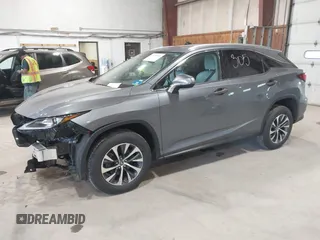 2020 Lexus RX 350 with VIN 2T2HZMDA6LC237701, listed as a IAAI auction lot 42358563 with 30,927 mi miles and . Bid and sale history available at DreamBid. Image 2.