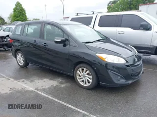 2015 Mazda 5 Sport with VIN JM1CW2BL9F0184636, listed as a IAAI auction lot 41972506 with 169,968 mi miles. Bid and sale history available at carsss.com. Image 1.