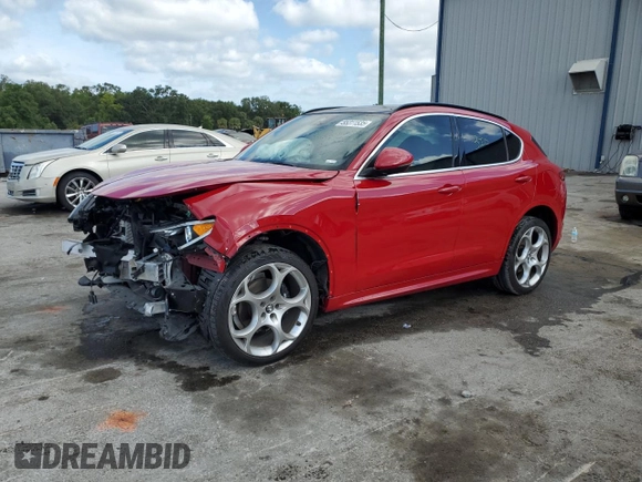 2023 Alfa Romeo Stelvio Ti z VIN ZASPAKBN2P7D65711, wystawiony jako Copart lot #55311535 z przebiegiem 32 906 mil mil oraz Nie do naprawy. Historia ofert i sprzedaży dostępna na DreamBid. Obrazek 1.