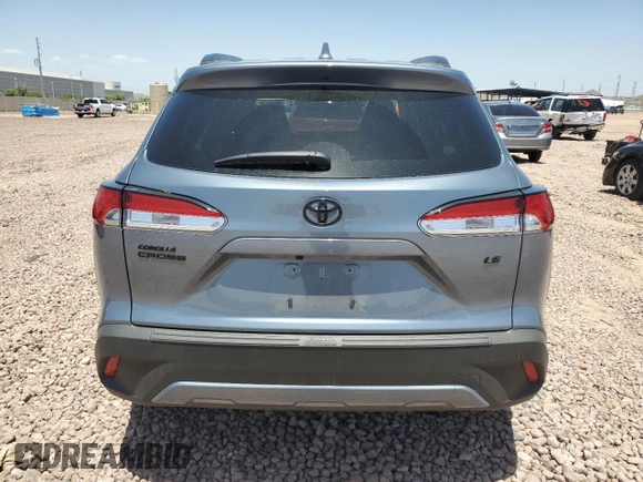 2023 Toyota Corolla Cross LE z VIN 7MUCAAAG3PV065644, wystawiony jako Copart lot #57070455 z przebiegiem 20 229 mil mil oraz Szkoda całkowita • Salvage title. Historia ofert i sprzedaży dostępna na DreamBid. Obrazek 6.