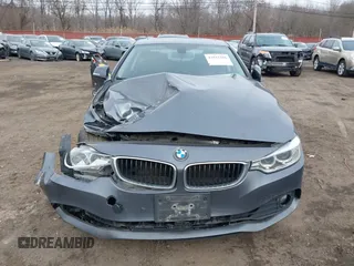 2014 BMW 4 Series 428i xDrive with VIN WBA3N9C50EK246002, listed as a IAAI auction lot 41612256 with 100,915 mi miles and . Bid and sale history available at carsss.com. Image 12.